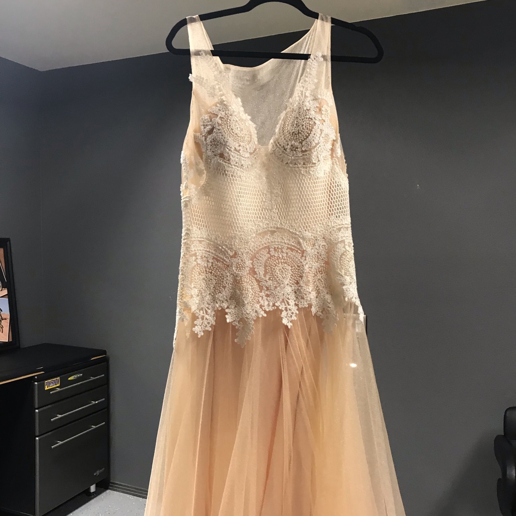 Wedding Dress. Originally 600. Never Been Worn